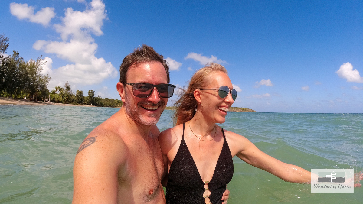 happy couple at beach at tropical island