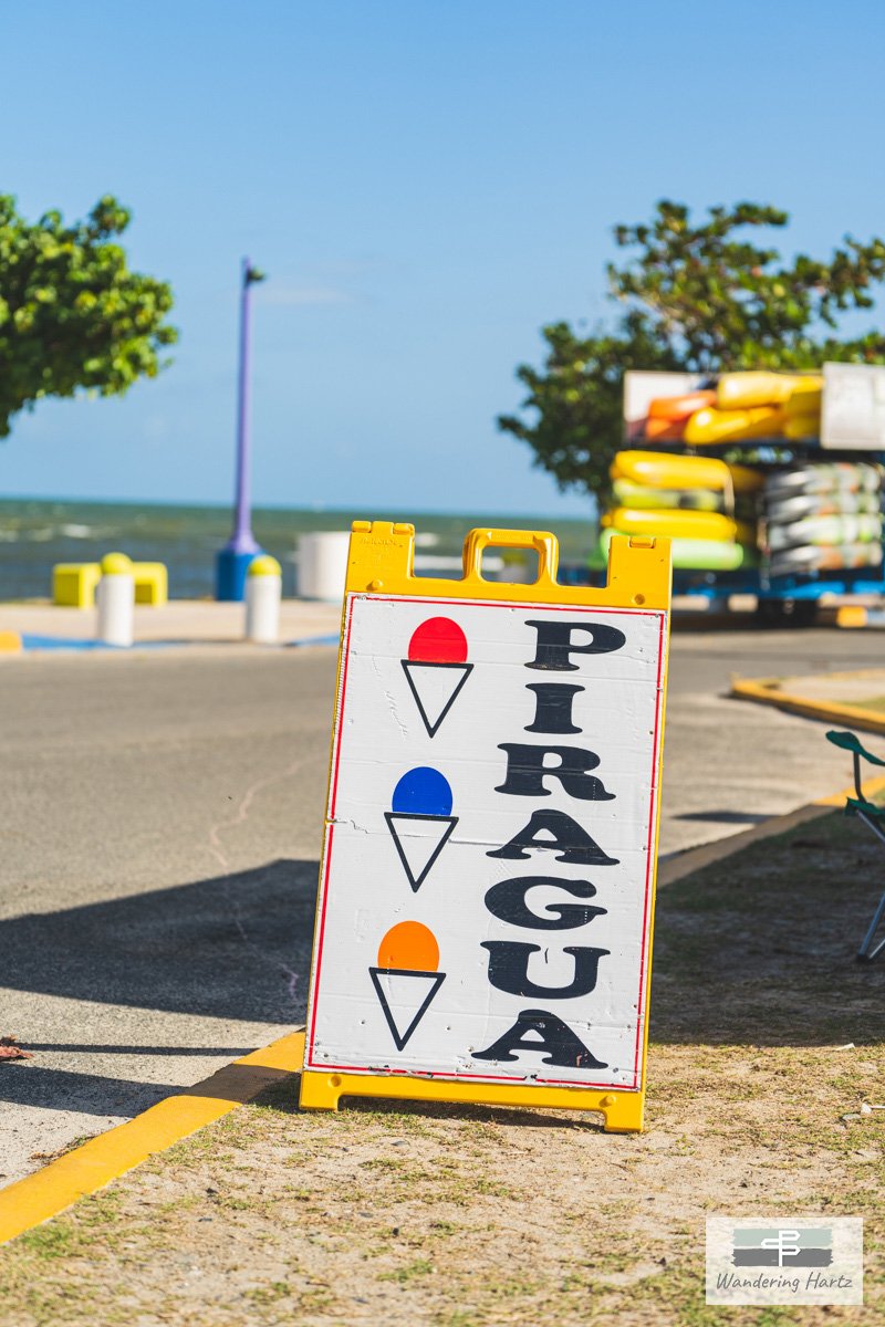 Wandering Hartz Sign advertising Piraguas for sale in Las Croabas Fajardo