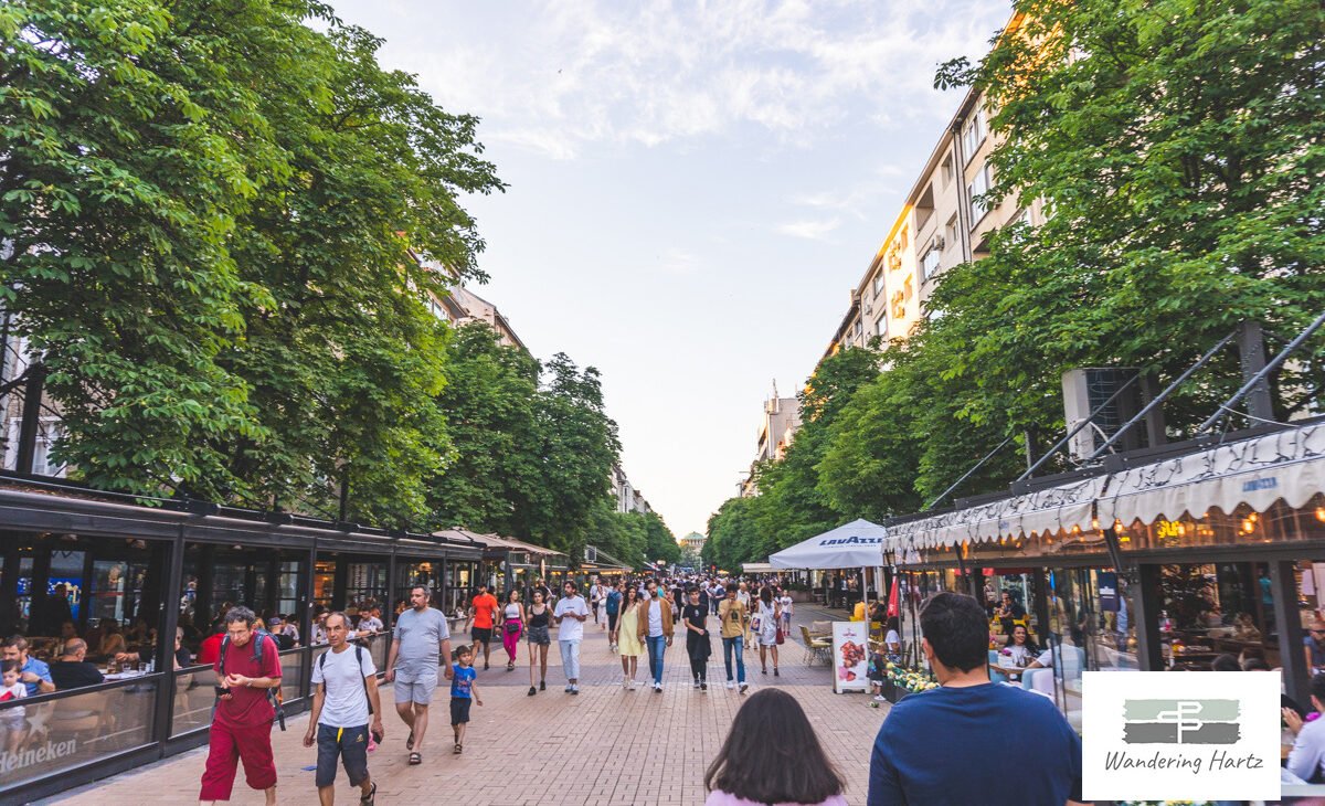 people walking along vitosha blvd sofia bulgaria in the spring