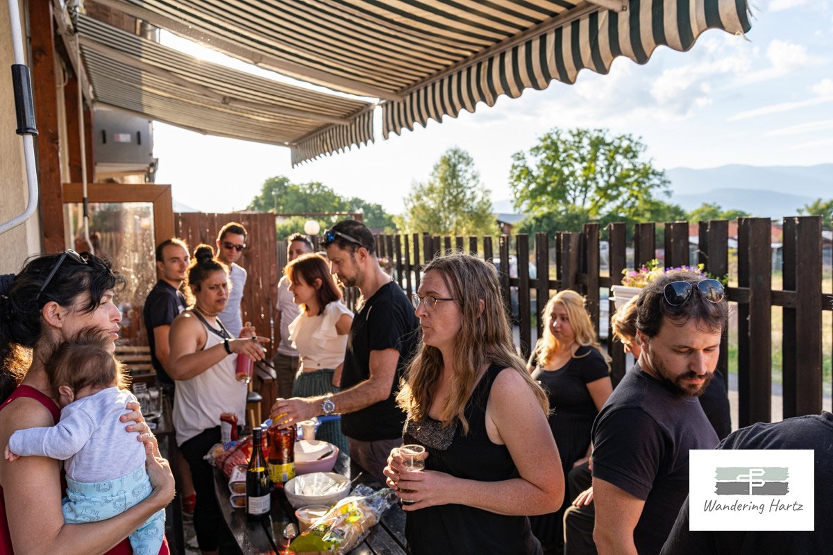 A group of people enjoying a bbq at four leaf coliving in bansko bulgaria