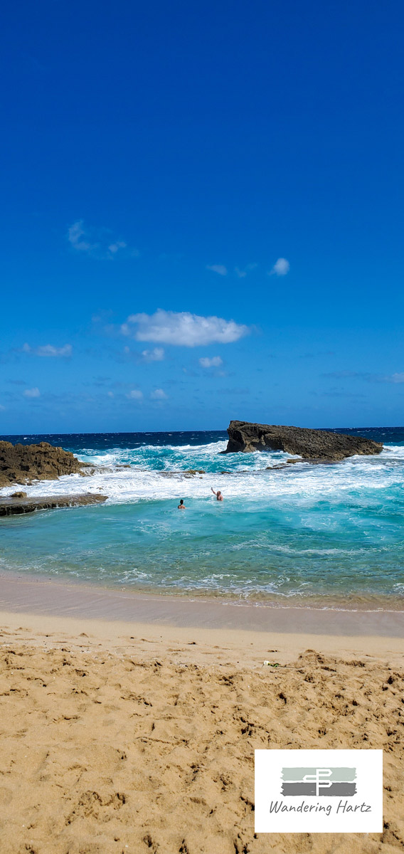 the protected swim area at Playa La Poza del Obispo in Arecibo, Puerto Rico on windy clear day