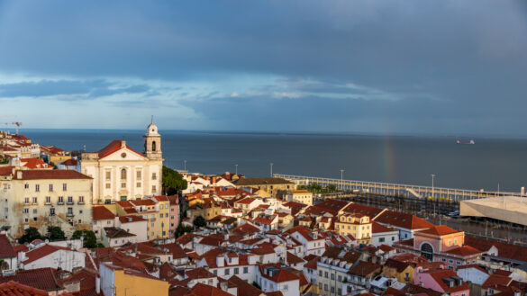 Rainbow ending in Alfama neighborhood of Lisbon Portugal