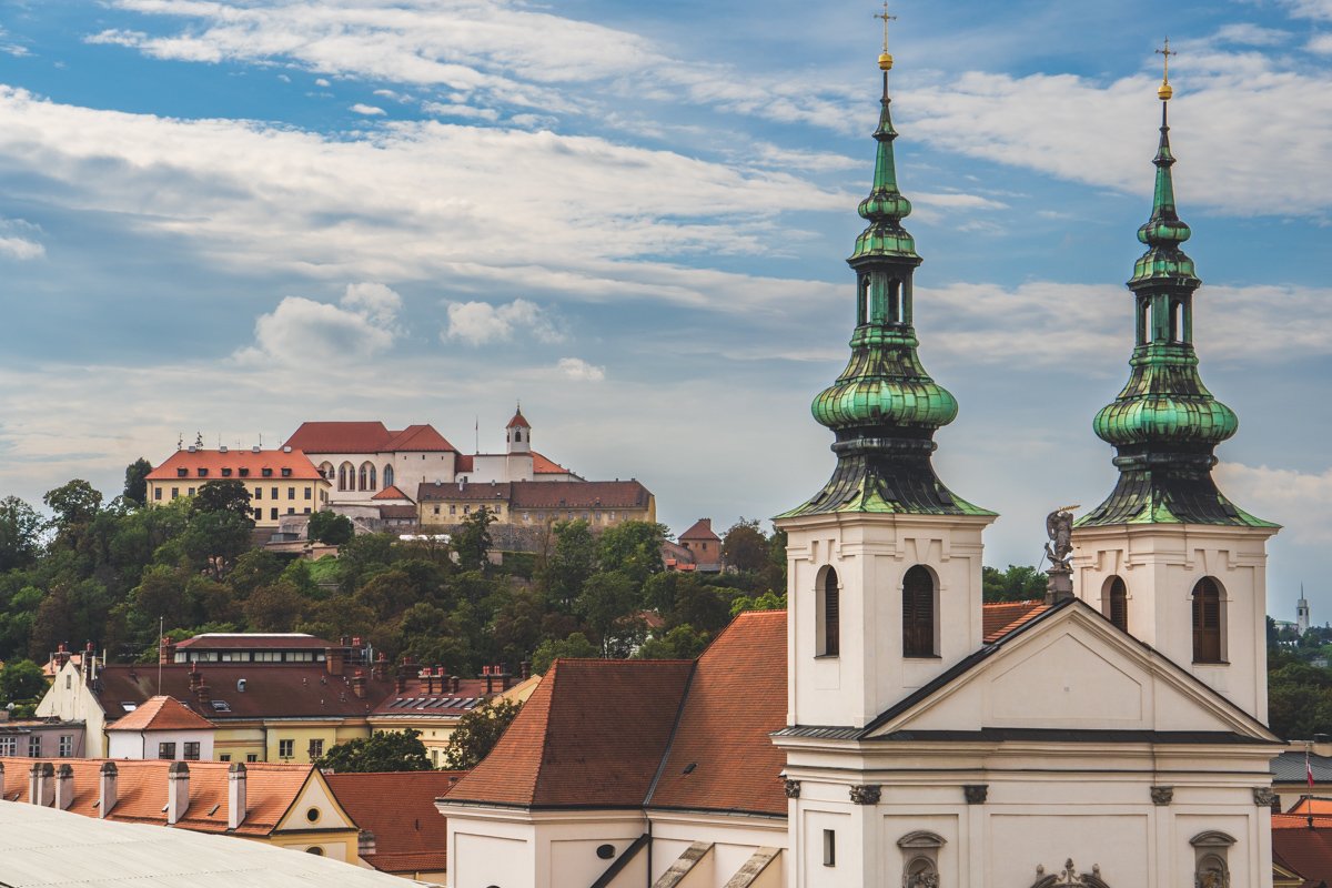 View of St. Michael Church spires and Špilberk Castle in background Brno, Czech Republic