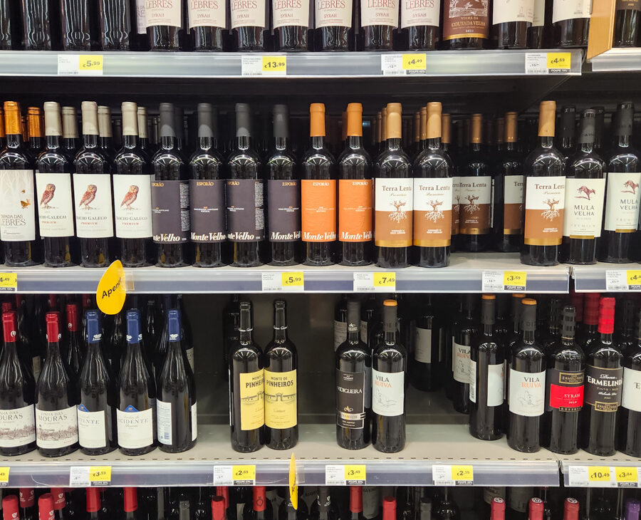 Shelves of bottle wine in grocery store in portugal