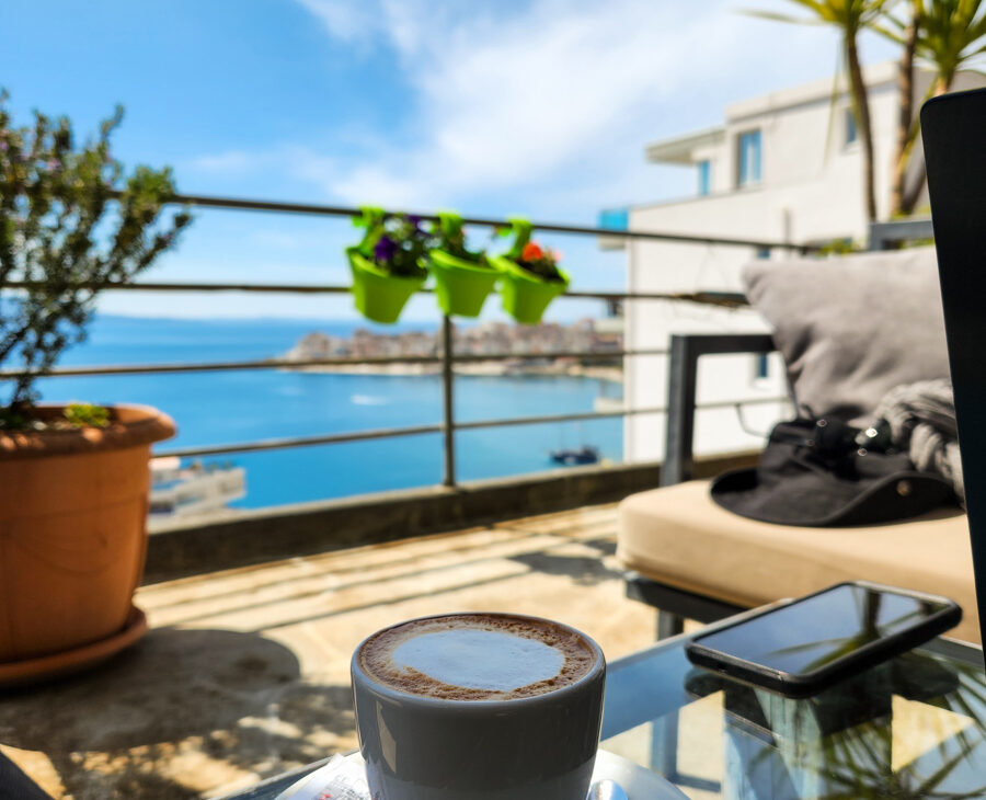vertical image of cappuccino with a view in saranda albania