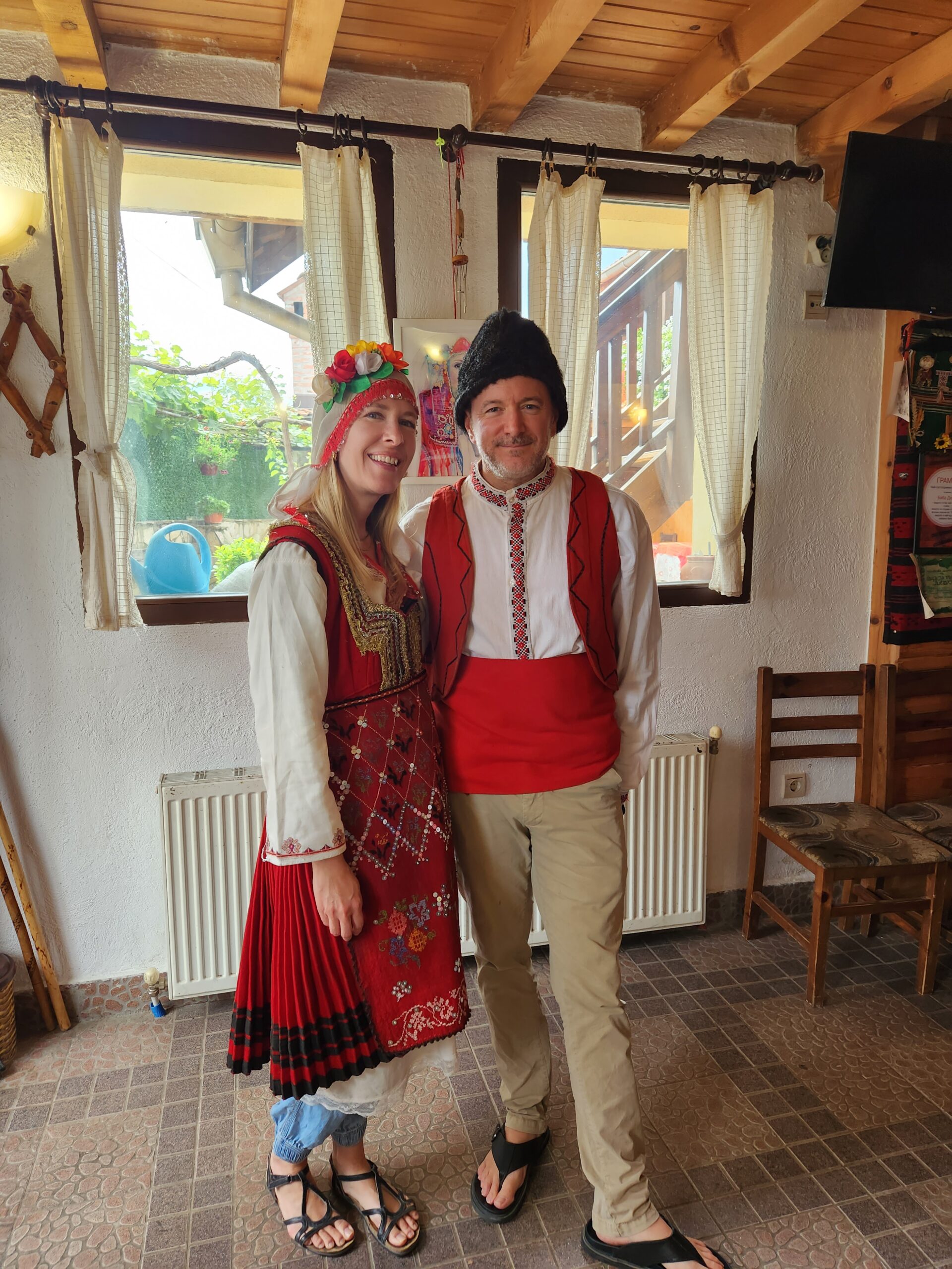 wandering hartz travel bloggers dressed in traditional bulgarian attire