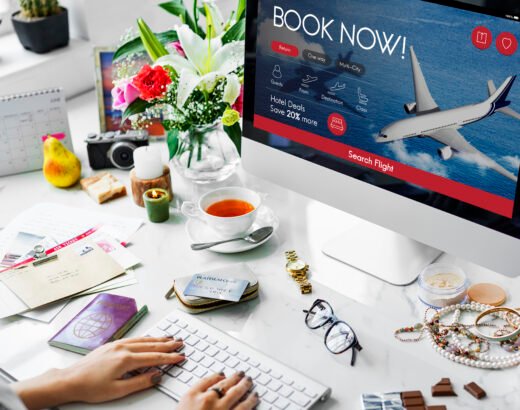 woman booking a flight on her computer