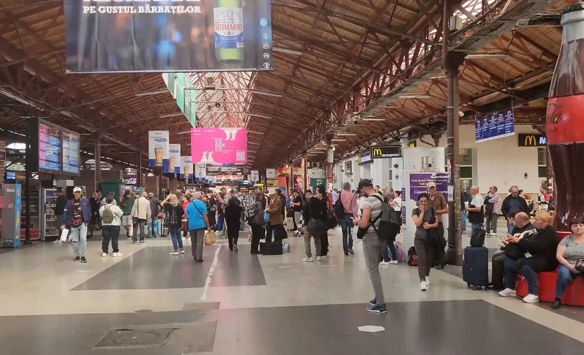 view of people in a Train Station in Brasov Romania